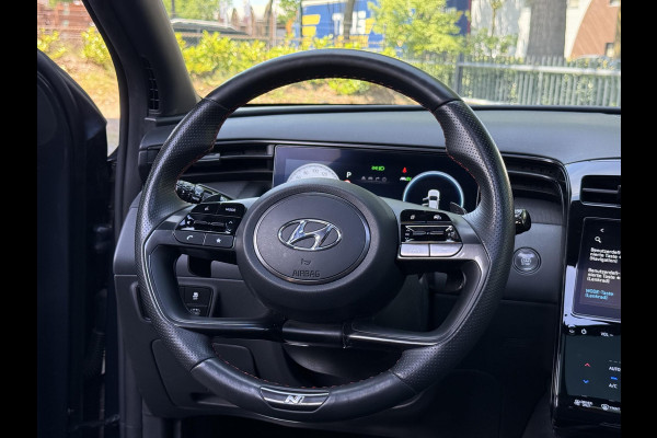 Hyundai Tucson 1.6 T-GDI HEV N Line VAN: 36.900,- VOOR: 34.877,- UW WKVOORDEEL: 2.023,-| PANO |DEALER ONDERHOUDEN| HYUNDAI GARANTIE T/M 02-2028| STOELVENTILATIE + VERWARMING| CAMERA | FULL OPTIONS| ACHTERBANK VERWARMD