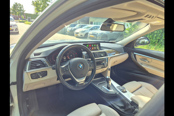 BMW 3-serie 320i Luxury Edition Individual Schuifdak Apple CarPlay Virtual dash Camera LED NAP 2e eigenaar 320i Luxury Edition