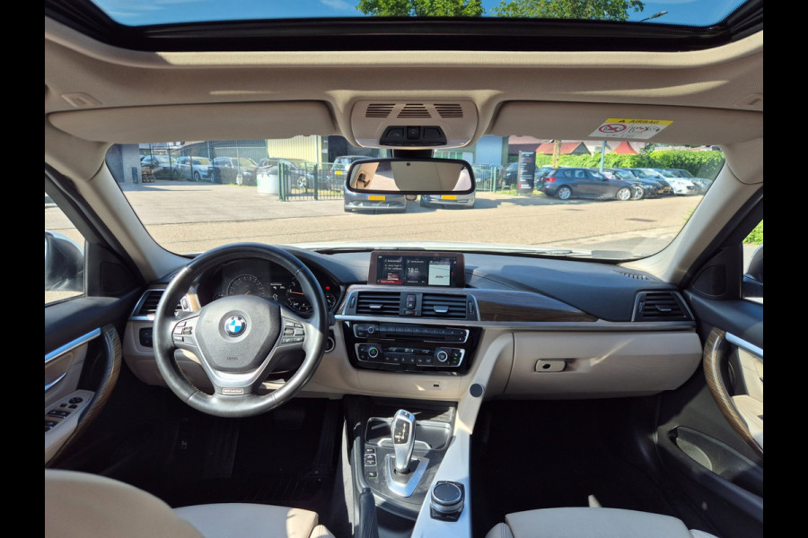 BMW 3-serie 320i Luxury Edition Individual Schuifdak Apple CarPlay Virtual dash Camera LED NAP 2e eigenaar 320i Luxury Edition