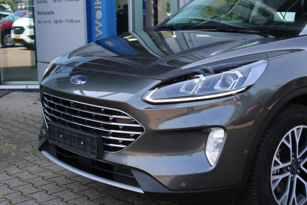 Ford Kuga 2.5 PHEV Titanium X | Wegklapbare trekhaak | Winter Pack | Adaptive cruise control | Dodehoeksesoren | Half leder | Bang&Olufsen
