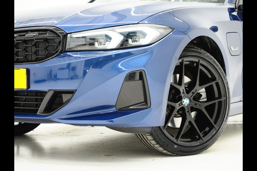 BMW 3 Serie Touring 320e xDrive LCI Shadow Line | Camera | Stoelverwarming | Cruise | LED | DAB | Carplay