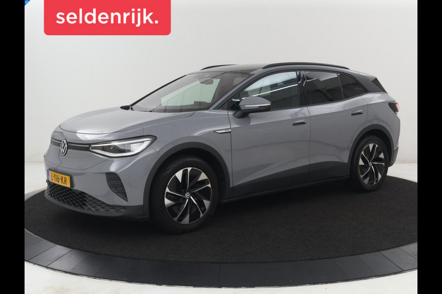Volkswagen ID.4 Tech 77 kWh | SOH 92,2% | Panorama | 360 Camera | Head up | Virtual cockpit | Sfeerverlichting | Stoel/Stuurverwarming | Adaptive cruise | Carplay | Traffic assist | Climate control | Half leder/velours
