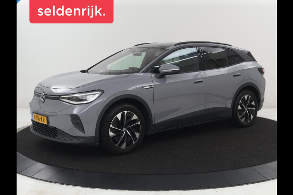 Volkswagen ID.4 Tech 77 kWh | SOH 92,2% | Panorama | 360 Camera | Head up | Virtual cockpit | Sfeerverlichting | Stoel/Stuurverwarming | Adaptive cruise | Carplay | Traffic assist | Climate control | Half leder/velours