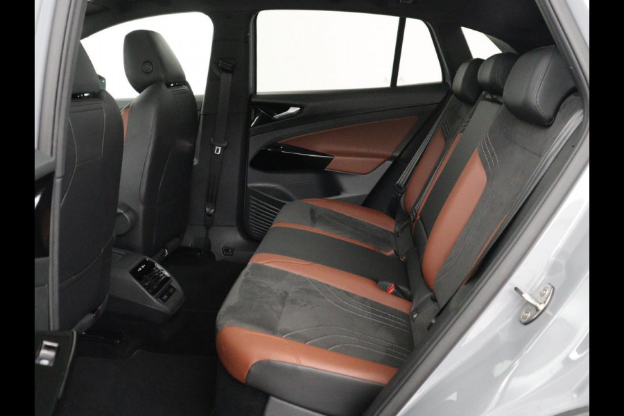 Volkswagen ID.4 Tech 77 kWh | SOH 92,2% | Panorama | 360 Camera | Head up | Virtual cockpit | Sfeerverlichting | Stoel/Stuurverwarming | Adaptive cruise | Carplay | Traffic assist | Climate control | Half leder/velours