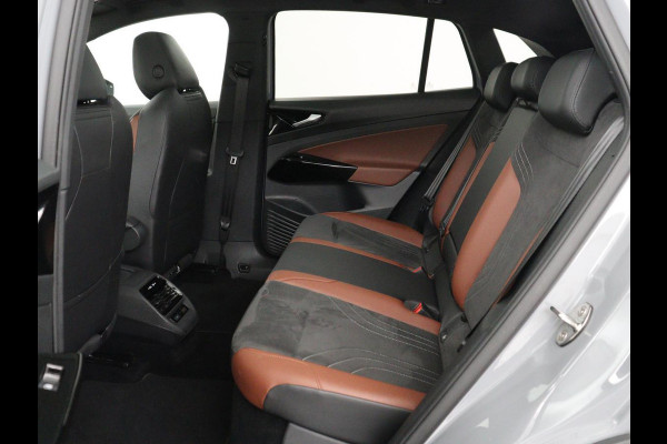Volkswagen ID.4 Tech 77 kWh | SOH 92,2% | Panorama | 360 Camera | Head up | Virtual cockpit | Sfeerverlichting | Stoel/Stuurverwarming | Adaptive cruise | Carplay | Traffic assist | Climate control | Half leder/velours