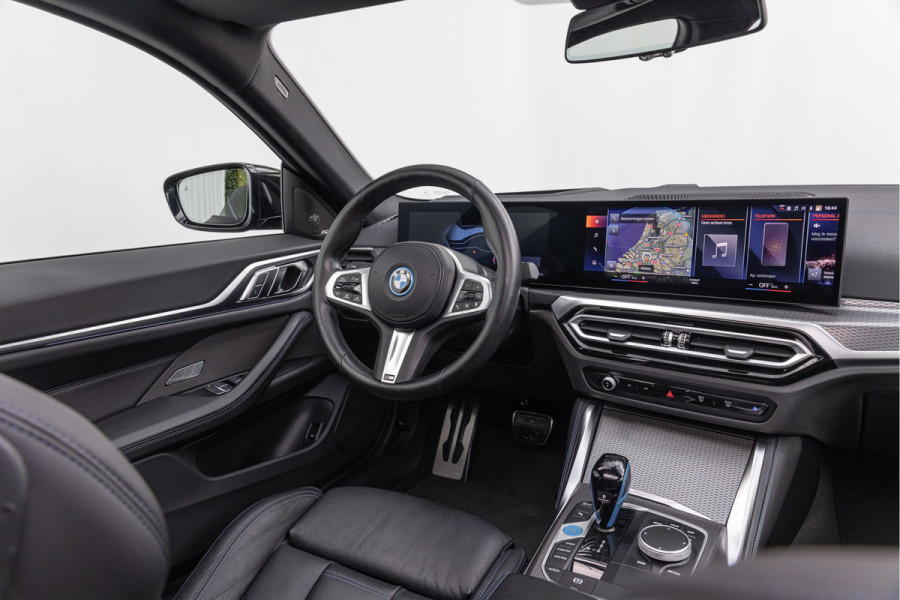 BMW i4 eDrive40 High Executive 84 kWh M-Pakket M-sportstoelen Schuif/kantel HuD