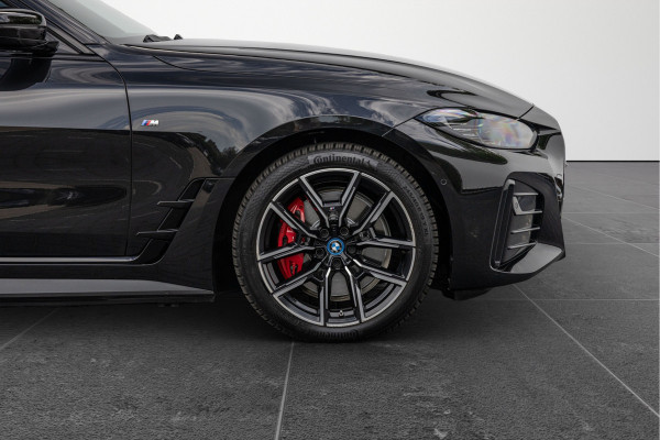 BMW i4 eDrive40 High Executive 84 kWh M-Pakket M-sportstoelen Schuif/kantel HuD
