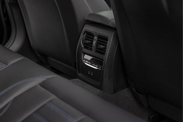 BMW i4 eDrive40 High Executive 84 kWh M-Pakket M-sportstoelen Schuif/kantel HuD