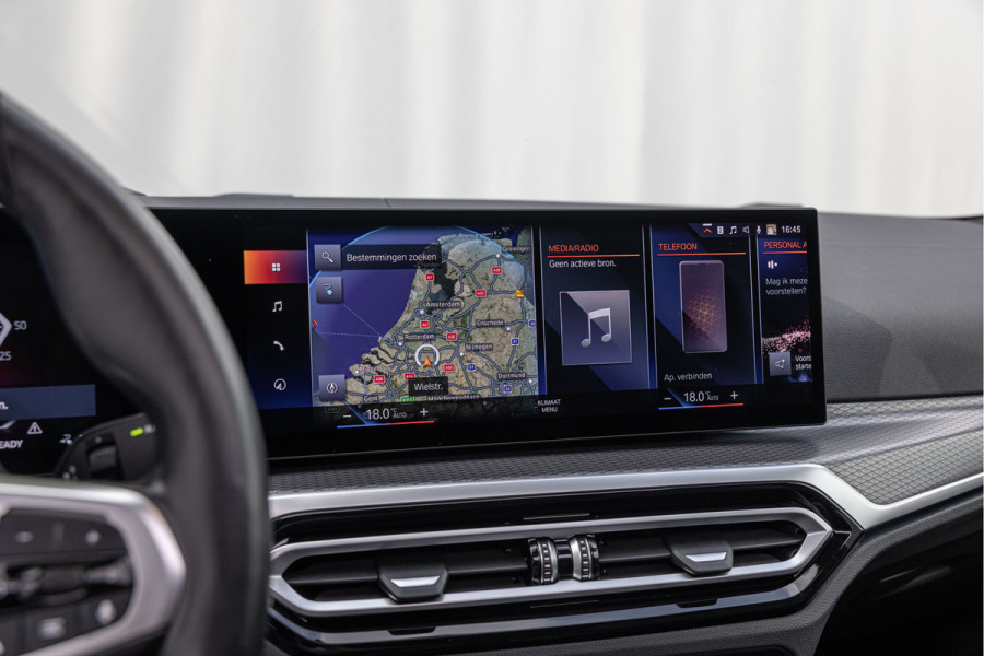 BMW i4 eDrive40 High Executive 84 kWh M-Pakket M-sportstoelen Schuif/kantel HuD