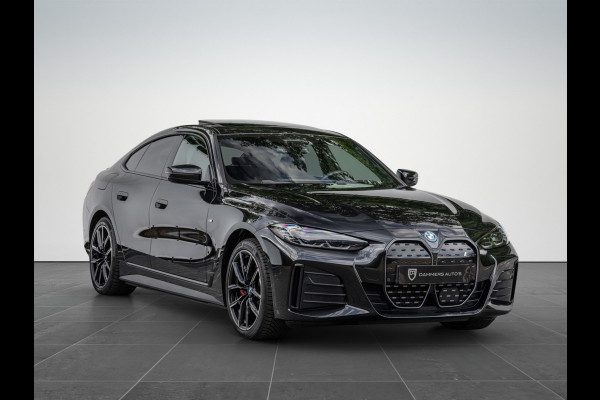 BMW i4 eDrive40 High Executive 84 kWh M-Pakket M-sportstoelen Schuif/kantel HuD