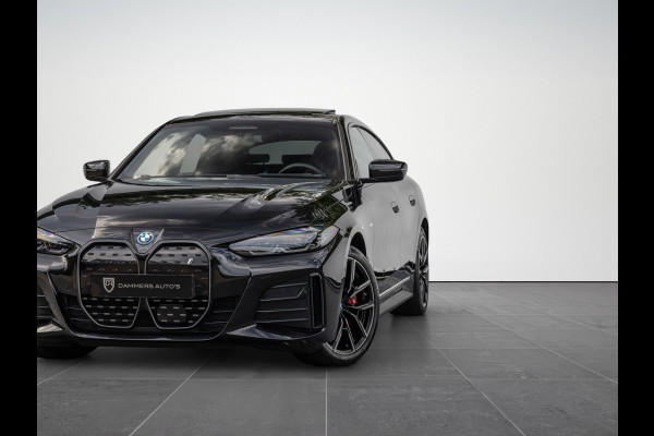 BMW i4 eDrive40 High Executive 84 kWh M-Pakket M-sportstoelen Schuif/kantel HuD
