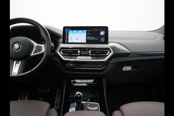 BMW iX3 M Sport 80 kWh 286pk Dealer O.H | Trekhaak Af Fabriek | Panodak | Laser LED | Head Up | Adaptive Cruise | 360 Camera | Lederen Sportstoelen Memory & Verwarmd | Harman / Kardon | Pilot Assist | Keyless | Blis | Apple Carplay | Navigatie | Virtual | DAB |