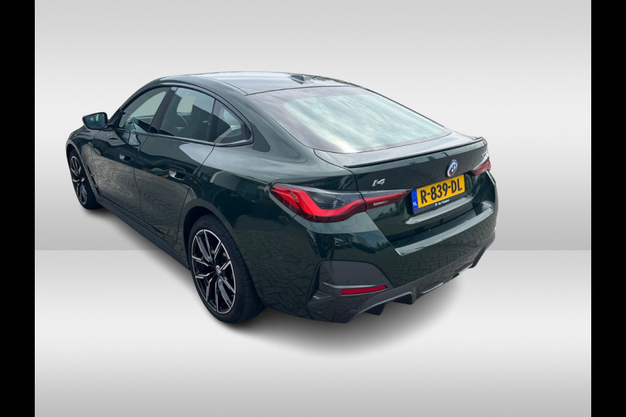 BMW i4 eDrive40 High Executive 84 kWh / SoH 99% / Trekhaak / Schuifdak / Camera / Head-up / Leder / 19'' / CarPlay / Stoelverwarming / Sfeerverlichting / Dodehoek / ACC