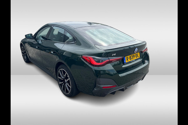 BMW i4 eDrive40 High Executive 84 kWh / SoH 99% / Trekhaak / Schuifdak / Camera / Head-up / Leder / 19'' / CarPlay / Stoelverwarming / Sfeerverlichting / Dodehoek / ACC