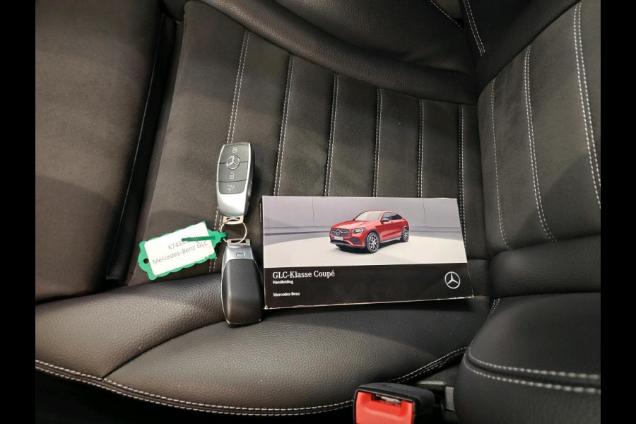 Mercedes-Benz GLC Coupé 300e 4MATIC Business Solution AMG | Magno | Stoelverwarming | Cruise Control | Ambiance Verlichting | Camera | Navigatie | Keyless | LED |