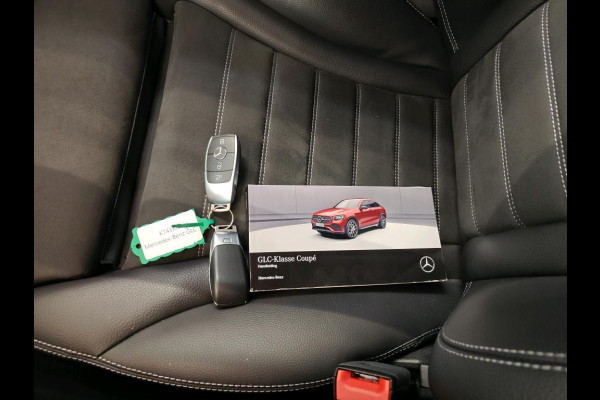 Mercedes-Benz GLC Coupé 300e 4MATIC Business Solution AMG | Magno | Stoelverwarming | Cruise Control | Ambiance Verlichting | Camera | Navigatie | Keyless | LED |