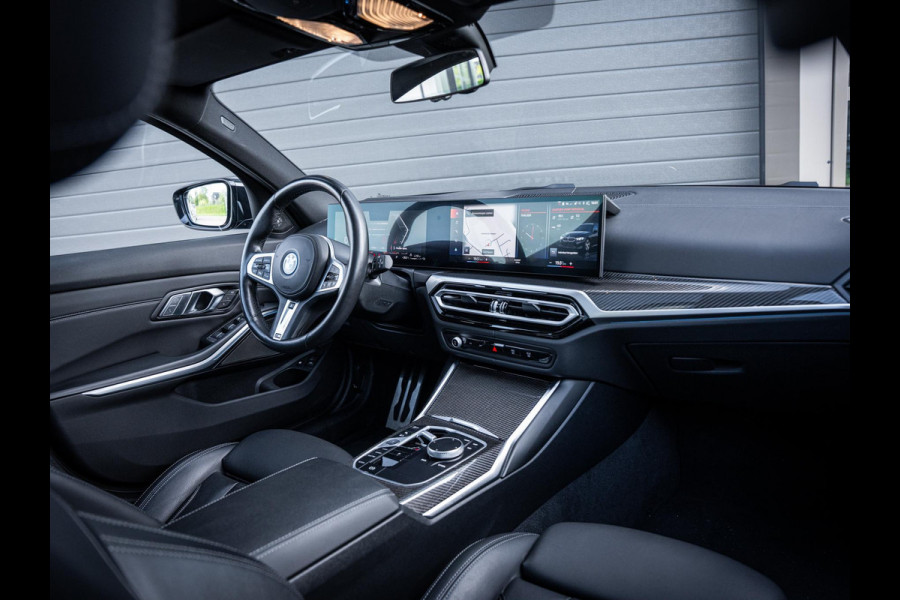 BMW 3 Serie Touring 330e xDrive M-Sport l LCI l HUD l Carbon l Pano l Trekhaak l Memory