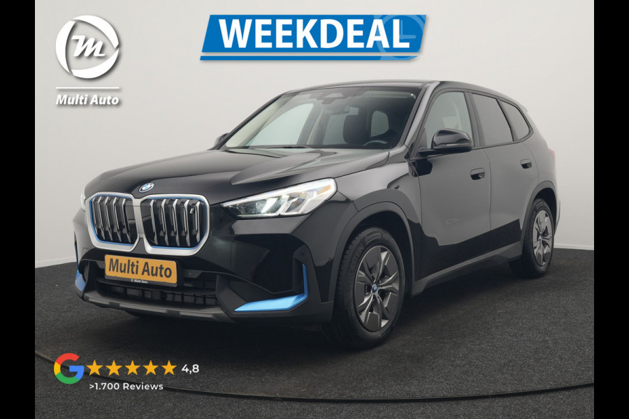 BMW iX1 xDrive30 67 kWh 313pk Dealer O.H. | Adaptief M Onderstel | Camera | Cruise Control | Stoelverwarming | Widescreen Navi | Park Assist | Apple Carplay | Navigatie | DAB | Standkachel |
