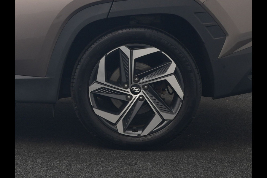 Hyundai Tucson 1.6 T-GDI Premium Sky 4WD PHEV 265pk Dealer O.H | Trekhaak | Panodak | Adaptive Cruise | 360 Camera | Lederen Sportstoelen Memory & Ventilatie | Blis | Apple Carplay | Krell Audio | Pilot Assist | Stuur & Stoelen Verwarmd | Navigatie | Virtual | DAB | 19"L.M | Plug In Hybrid |