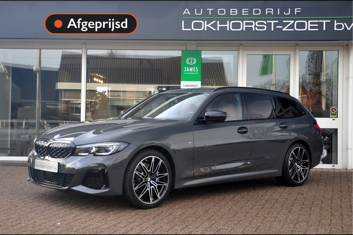BMW 3 Serie Touring M340i xDrive | Dravit Grau | Panoramadak | Laser | Premium Selection garantie t/m 09/2027
