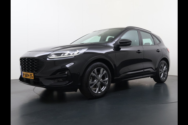 Ford Kuga 1.5T 150PK ST-Line Trekhaak Adap.Cruise Stoel+Stuur+Achterbank+Voorruitverwarming Elek.Achterklep Camera Apple Carplay/Android A Lmv 18" DAB Bluetooth Parkeerhulp Led Lane Assist Isofix Road Edge Detection WiFi 1.800KG Trekgewicht
