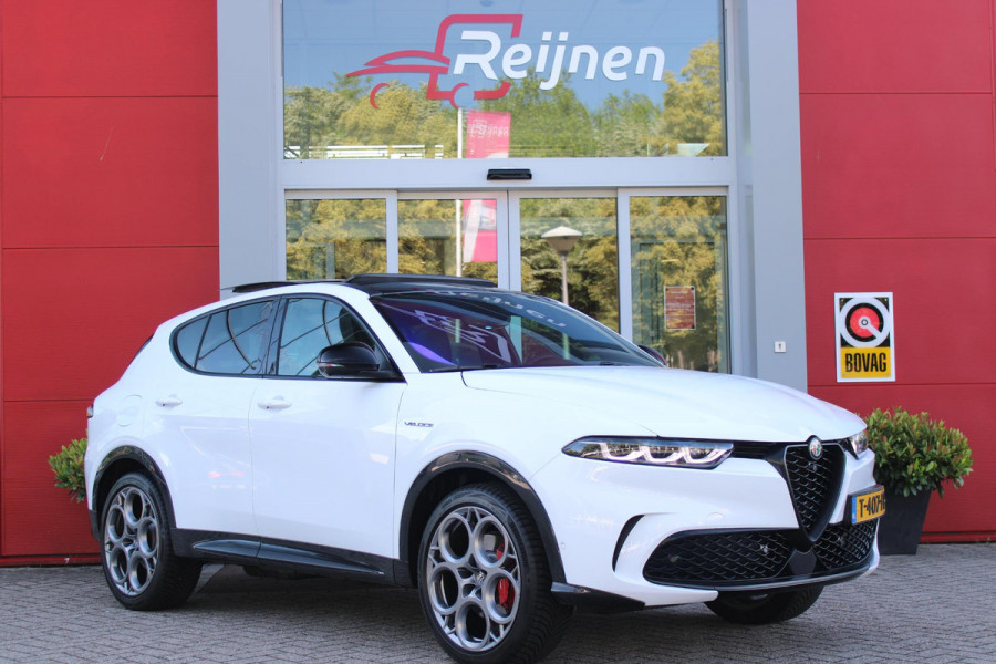 Alfa Romeo Tonale PHEV 280PK VELOCE | PANORAMISCH SCHUIF/KANTEL DAK | PREMIUM PACK: LEDEREN BEKLEDING/GEVENTILEERDE VOORSTOELEN/4-VOUDIG ELEKTRISCH VERSTELBARE LENDESTEUN VOORSTOELEN/HOOGGLANS ZWARTE RAAMOMLIJSTING/AMBIENT LIGHTING | TECHNOLOGY PACK: PARKEERWAARSCHUWING VOOR EN ACHTER/360° CAMERA/AUTOMATISCH INPARKEREN/ AUTONOMOUS DRIVING LEVEL 2: ADAPTIVE CRUISE CONTROL/LANE CENTERING ASSIST/TRAFFIC JAM ASSIST DODEHOEK DETECTIE AUTOMATISCH DIMMENDE BUITENSPIEGELS ELEKTRISCH BEDIENBARE ACHTERKLEP | WINTERPACK: STOELVERWARMING VOOR/STUURVERWARMING/VERWARMBARE RUITENSPROEIERS | HARMAN KAR