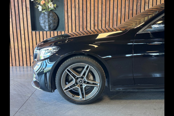 Mercedes-Benz C-Klasse 180 Business Solution AMG / Virtual / Carplay / Stoelverwarming / Sfeerverlichting / Trekhaak / ACC /