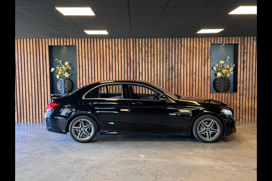 Mercedes-Benz C-Klasse 180 Business Solution AMG / Virtual / Carplay / Stoelverwarming / Sfeerverlichting / Trekhaak / ACC /