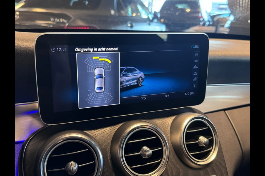 Mercedes-Benz C-Klasse 180 Business Solution AMG / Virtual / Carplay / Stoelverwarming / Sfeerverlichting / Trekhaak / ACC /