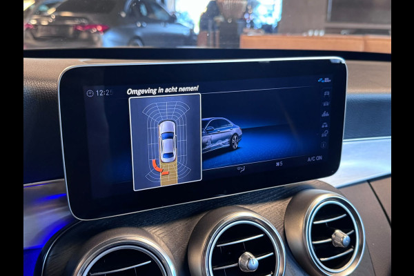 Mercedes-Benz C-Klasse 180 Business Solution AMG / Virtual / Carplay / Stoelverwarming / Sfeerverlichting / Trekhaak / ACC /