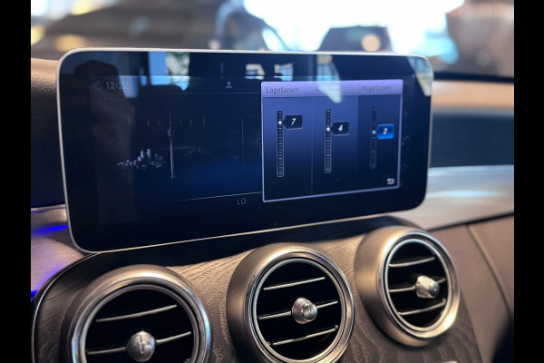 Mercedes-Benz C-Klasse 180 Business Solution AMG / Virtual / Carplay / Stoelverwarming / Sfeerverlichting / Trekhaak / ACC /