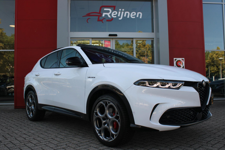 Alfa Romeo Tonale PHEV 280PK VELOCE | PANORAMISCH SCHUIF/KANTEL DAK | PREMIUM PACK: LEDEREN BEKLEDING/GEVENTILEERDE VOORSTOELEN/4-VOUDIG ELEKTRISCH VERSTELBARE LENDESTEUN VOORSTOELEN/HOOGGLANS ZWARTE RAAMOMLIJSTING/AMBIENT LIGHTING | TECHNOLOGY PACK: PARKEERWAARSCHUWING VOOR EN ACHTER/360° CAMERA/AUTOMATISCH INPARKEREN/ AUTONOMOUS DRIVING LEVEL 2: ADAPTIVE CRUISE CONTROL/LANE CENTERING ASSIST/TRAFFIC JAM ASSIST DODEHOEK DETECTIE AUTOMATISCH DIMMENDE BUITENSPIEGELS ELEKTRISCH BEDIENBARE ACHTERKLEP | WINTERPACK: STOELVERWARMING VOOR/STUURVERWARMING/VERWARMBARE RUITENSPROEIERS | HARMAN KAR
