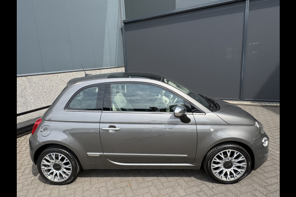 Fiat 500C 0.9 TwinAir Turbo Lounge Automaat Glazen panoramadak - Airco - Navigatie - Parkeersensor achter - Licht metalen velgen 15 inch - Cruise control - Mistlampen - Elektrische ramen - Stuur multifunctioneel - Bluetooth - Centrale vergrendeling met afstandsbediening - Start/stop systeem