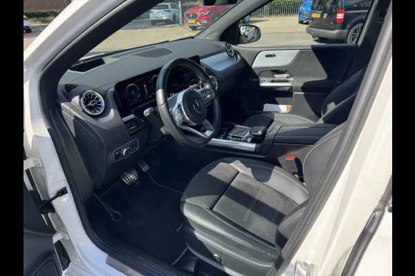 Mercedes-Benz B-Klasse 250 e Business Solution AMG Limited VAN: 30.900,- VOOR: 28.877,- UW WKVOORDEEL: 2.023-  | PANORAMA DAK | 360 CAMERA | SFEER VERLICHTING | ADAPTIEF CRUISE CONTROL | MEMORY OP STOEL | HEAD-UP DISPLAY | 12 MND BOVAG GARANTIE |