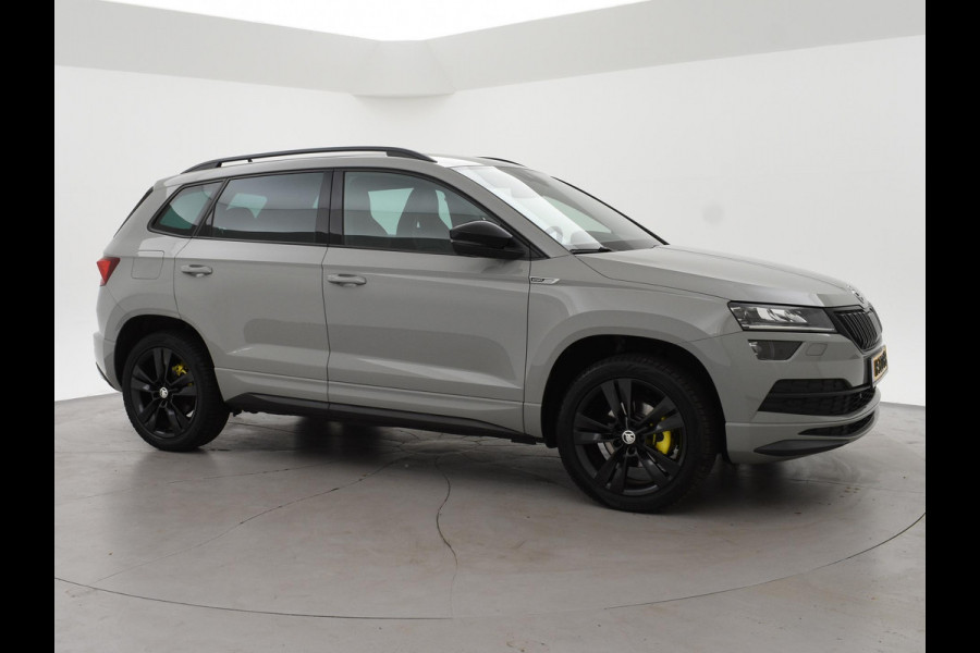 Škoda Karoq 1.5 TSI ACT SPORTLINE + WEGKL. TREKHAAK | VOL LEDER | ADAPTIVE CRUISE | CANTON | CAMERA