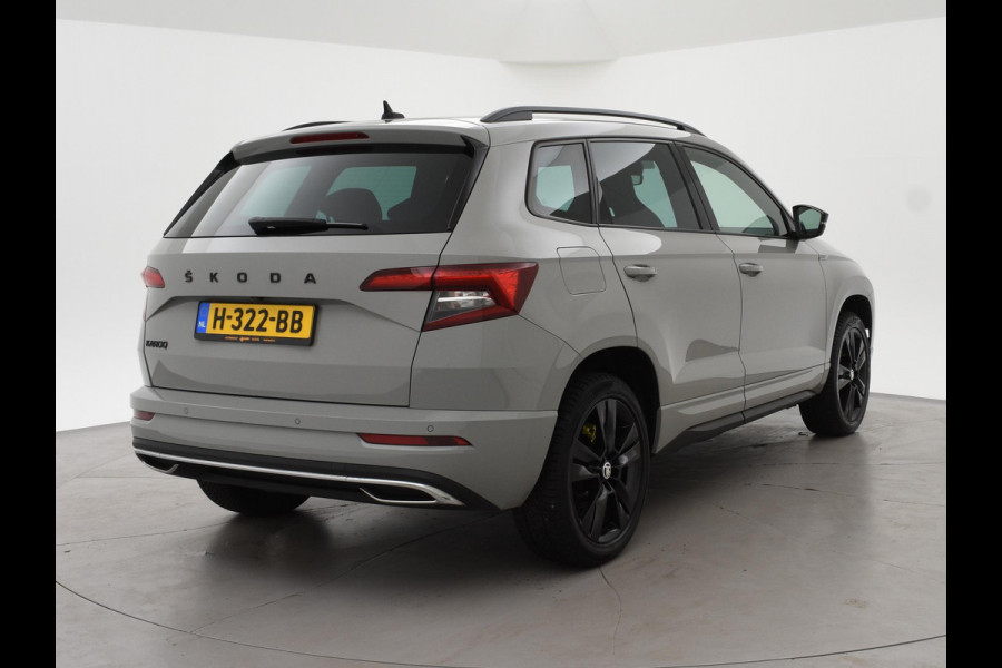 Škoda Karoq 1.5 TSI ACT SPORTLINE + WEGKL. TREKHAAK | VOL LEDER | ADAPTIVE CRUISE | CANTON | CAMERA