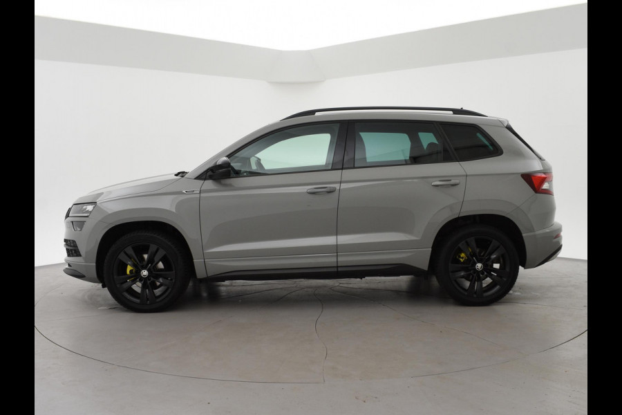 Škoda Karoq 1.5 TSI ACT SPORTLINE + WEGKL. TREKHAAK | VOL LEDER | ADAPTIVE CRUISE | CANTON | CAMERA