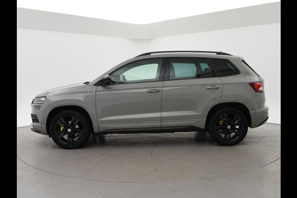 Škoda Karoq 1.5 TSI ACT SPORTLINE + WEGKL. TREKHAAK | VOL LEDER | ADAPTIVE CRUISE | CANTON | CAMERA