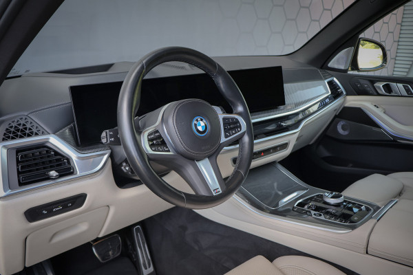 BMW X5 xDrive50e Launch Edition SKYLOUNGE | MASSAGE | STOELVERKOELING & VERWARMING | BOWERS & WILKINS | SFEERVERLICHTING | 360 CAMERA | CARPLAY | CARBON INTERIEUR | STUURVERWARMING |