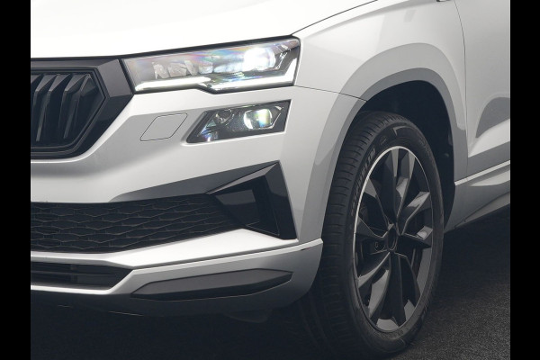 Škoda Karoq 1.5 TSI ACT Sportline Facelift Model 150pk DSG Dealer O.H | Trekhaak Af Fabriek | Adaptive Cruise | Crystal LED | Lederen Sportstoelen Memory & Verwarmd | Keyless | Sfeerverlichting | Apple Carplay | Verwarmd Sportstuur | Navigatie | Virtual | DAB |