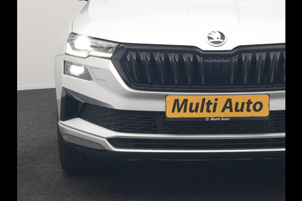 Škoda Karoq 1.5 TSI ACT Sportline Facelift Model 150pk DSG Dealer O.H | Trekhaak Af Fabriek | Adaptive Cruise | Crystal LED | Lederen Sportstoelen Memory & Verwarmd | Keyless | Sfeerverlichting | Apple Carplay | Verwarmd Sportstuur | Navigatie | Virtual | DAB |