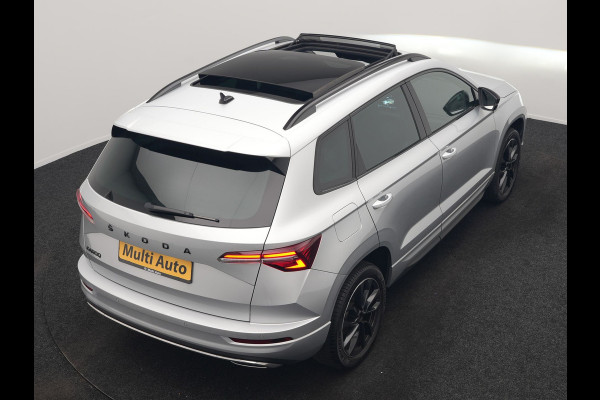 Škoda Karoq 1.5 TSI ACT Sportline Facelift Model 150pk DSG Dealer O.H | Trekhaak Af Fabriek | Adaptive Cruise | Crystal LED | Lederen Sportstoelen Memory & Verwarmd | Keyless | Sfeerverlichting | Apple Carplay | Verwarmd Sportstuur | Navigatie | Virtual | DAB |