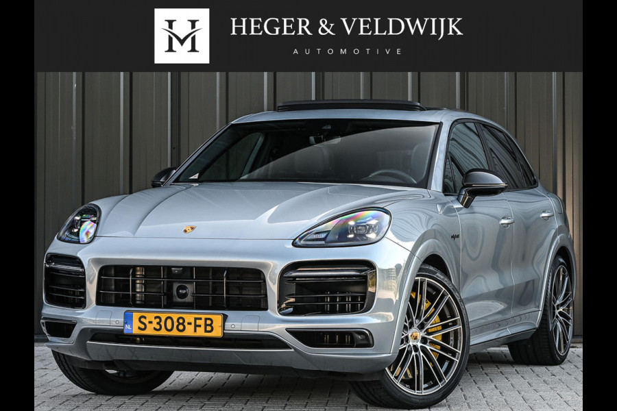 Porsche Cayenne 3.0 E-Hybrid | NL-Auto | Keramische Remmen | Achterasbesturing | Stoelmassage en -Ventilatie | Carbon Design | Luchtvering | 360 Camera | Panoramadak | Sport Chrono | Soft Close | 14-Wegs Memory Seats | Stuur Verwarmd |
