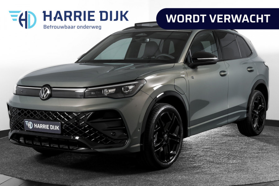 Volkswagen Tiguan 1.5 eHybrid R-Line Edition 272 PK | Black Style | 15 inch Navi | Elek. Trekhaak | IQ Light | S/K-Panodak | Dig. Cockpit | Adapt. Cruise | Stoel-+Stuurverw. | 360 Camera | NAV + App. Connect | ECC | Elek. Klep | LM 20" | 4296