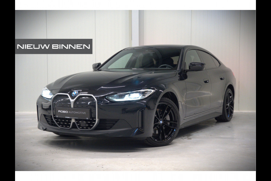 BMW i4 eDrive40 84 kWh | Stoelverwarming | Stuurverwarming | Apple Carplay | Adaptive Cruise Control | Memory Seat | Trekhaak | Camera | Parkeersensoren | Navigatie | Ambiance Verlichting | HIFI | SOH 96.52% |