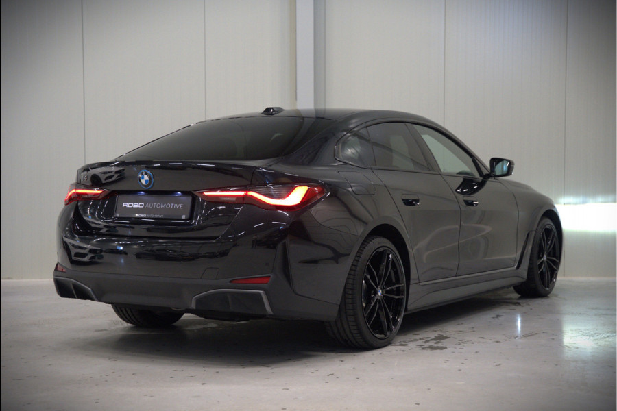 BMW i4 eDrive40 84 kWh | Stoelverwarming | Stuurverwarming | Apple Carplay | Adaptive Cruise Control | Memory Seat | Trekhaak | Camera | Parkeersensoren | Navigatie | Ambiance Verlichting | HIFI | SOH 96.52% |