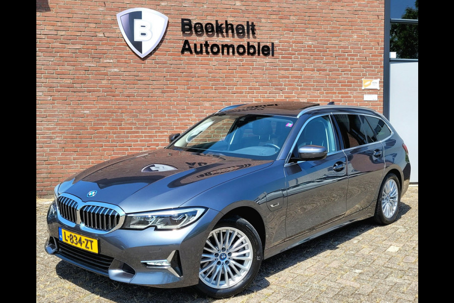 BMW 3 Serie Touring 320e Luxury - Pano, Trekhaak, Laser (NL NAP BTW)