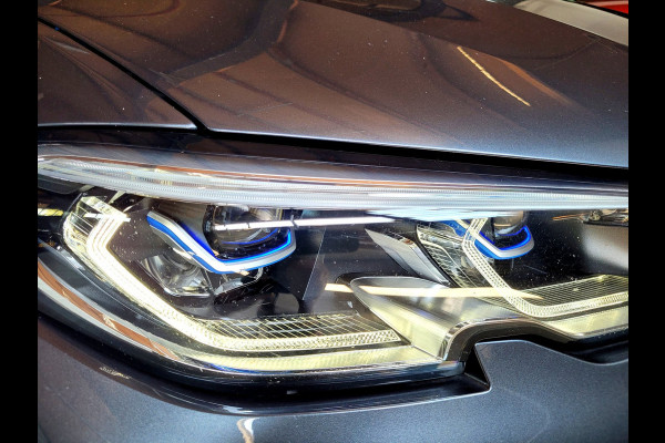 BMW 3 Serie Touring 320e Luxury - Pano, Trekhaak, Laser (NL NAP BTW)