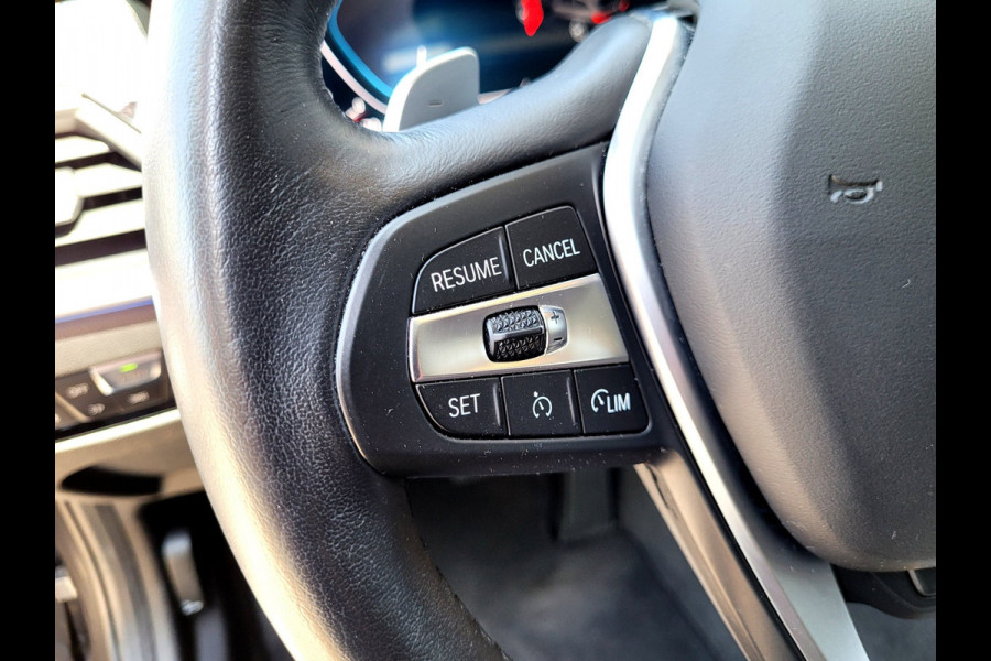 BMW 3 Serie Touring 320e Luxury - Pano, Trekhaak, Laser (NL NAP BTW)