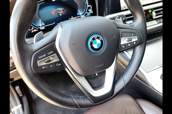 BMW 3 Serie Touring 320e Luxury - Pano, Trekhaak, Laser (NL NAP BTW)